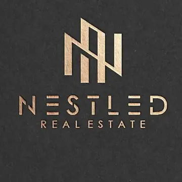 Nestled Real Estate logo design